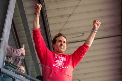 260425 - Wrexham v Charlton Athletic - Sky Bet League 1 - Wrexham co-owner Ryan Reynolds celebrates at full time