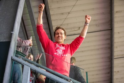 260425 - Wrexham v Charlton Athletic - Sky Bet League 1 - Wrexham co-owner Ryan Reynolds celebrates at full time