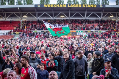 260425 - Wrexham v Charlton Athletic - Sky Bet League 1 - Wrexham fans celebrate following their promotion