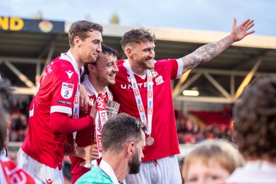 260425 - Wrexham v Charlton Athletic - Sky Bet League 1 - Wrexham players celebrate at full time