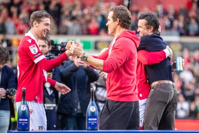 260425 - Wrexham v Charlton Athletic - Sky Bet League 1 - Wrexham Co-Owners Ryan Reynolds and Rob McElheney celebrate following the Wrexham victory over Charlton