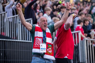 260425 - Wrexham v Charlton Athletic - Sky Bet League 1 - Wrexham fans celebrate their third goal