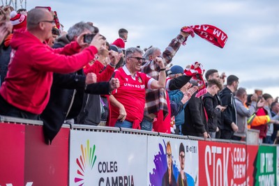 260425 - Wrexham v Charlton Athletic - Sky Bet League 1 - Wrexham fans celebrate their third goal