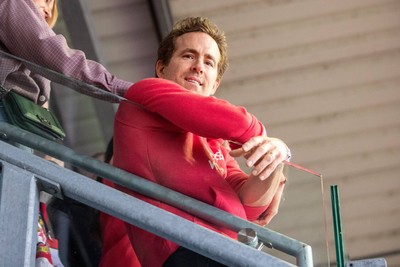 260425 - Wrexham v Charlton Athletic - Sky Bet League 1 - Wrexham co-owner Ryan Reynolds celebrates Wrexham’s promotion