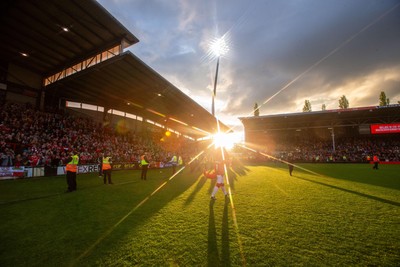 260425 - Wrexham v Charlton Athletic - Sky Bet League 1 - Wrexham fans celebrate their promotion at full time
