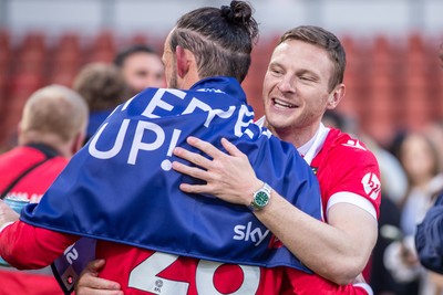 260425 - Wrexham v Charlton Athletic - Sky Bet League 1 - Wrexham players celebrate their promotion at full time
