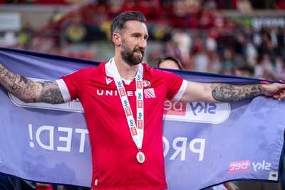 260425 - Wrexham v Charlton Athletic - Sky Bet League 1 - Ollie Palmer of Wrexham celebrates their promotion at full time