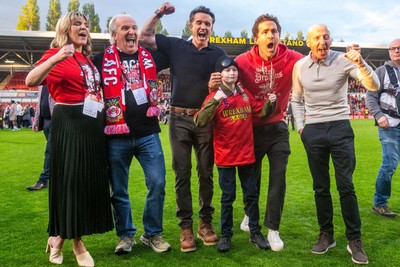260425 - Wrexham v Charlton Athletic - Sky Bet League 1 - Wrexham Co-Owners Rob McElheney, Ryan Reynolds and ex-Wrexham player Mickey Thomas following Wrexham’s victory over Charlton