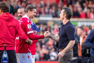260425 - Wrexham v Charlton Athletic - Sky Bet League 1 -  Lewis Brunt of Wrexham AFC celebrates with co-owner Rob McElheney
