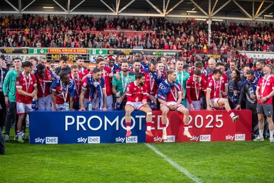 260425 - Wrexham v Charlton Athletic - Sky Bet League 1 - Wrexham players celebrate promotion