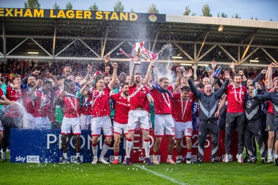 260425 - Wrexham v Charlton Athletic - Sky Bet League 1 - James McClean of Wrexham AFC lifts the Sky Bet League 1 Promotion trophy