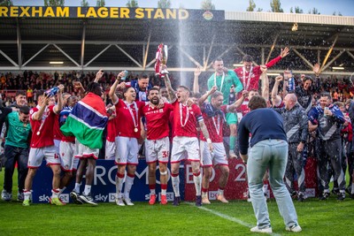 260425 - Wrexham v Charlton Athletic - Sky Bet League 1 - James McClean of Wrexham AFC lifts the Sky Bet League 1 Promotion trophy