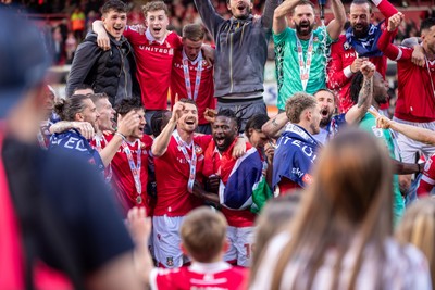260425 - Wrexham v Charlton Athletic - Sky Bet League 1 - Wrexham players celebrate at full time