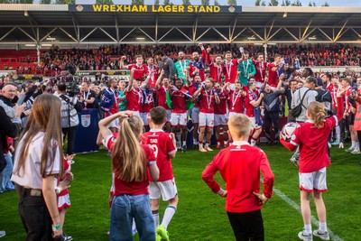 260425 - Wrexham v Charlton Athletic - Sky Bet League 1 - Wrexham players celebrate at full time