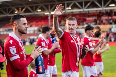 260425 - Wrexham v Charlton Athletic - Sky Bet League 1 - Wrexham players celebrate at full time