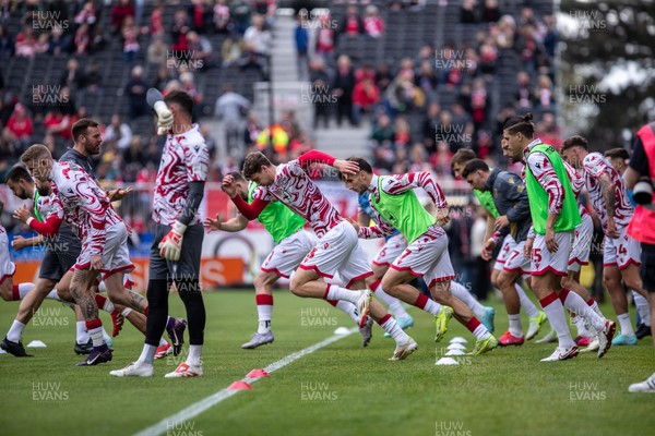 260425 - Wrexham v Charlton Athletic - Sky Bet League 1 - Wrexham players warm up ahead of kick off