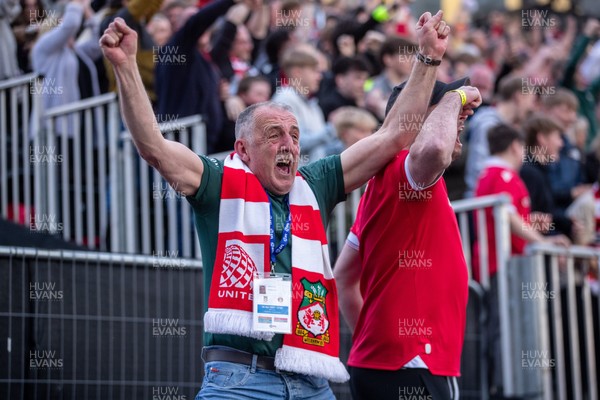 260425 - Wrexham v Charlton Athletic - Sky Bet League 1 - Wrexham fans celebrate their third goal
