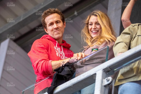 260425 - Wrexham v Charlton Athletic - Sky Bet League 1 - Wrexham co-owner Ryan Reynolds and his wife Blake Lively celebrate at full time 