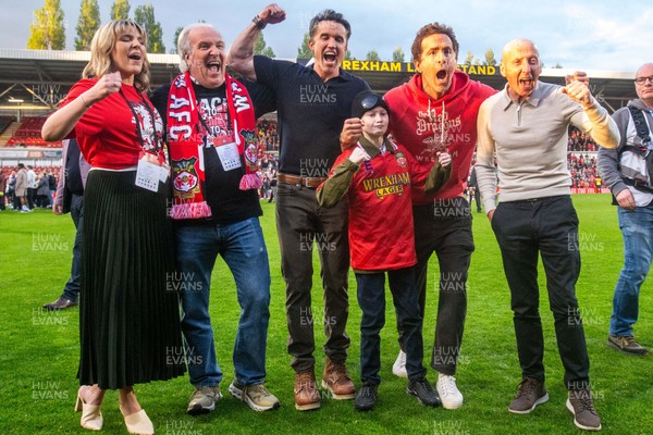 260425 - Wrexham v Charlton Athletic - Sky Bet League 1 - Wrexham Co-Owners Rob McElheney, Ryan Reynolds and ex-Wrexham player Mickey Thomas following Wrexham’s victory over Charlton
