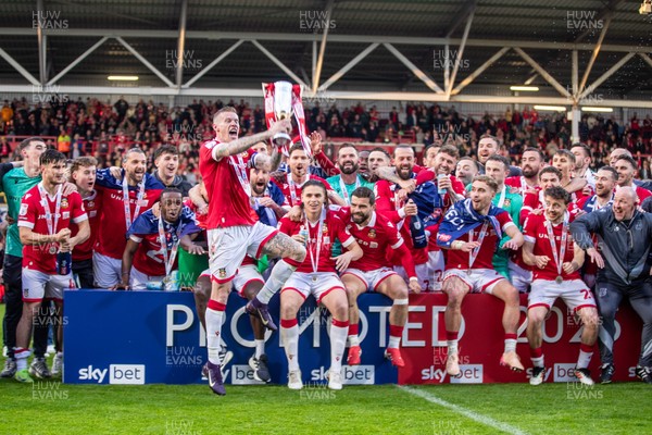 260425 - Wrexham v Charlton Athletic - Sky Bet League 1 - James McClean of Wrexham AFC lifts the Sky Bet League 1 Promotion trophy