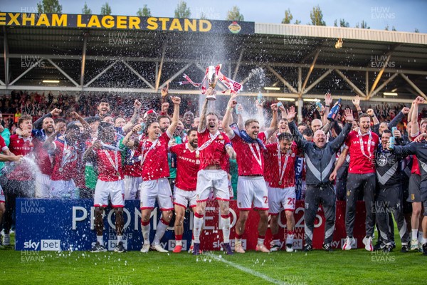 260425 - Wrexham v Charlton Athletic - Sky Bet League 1 - James McClean of Wrexham AFC lifts the Sky Bet League 1 Promotion trophy