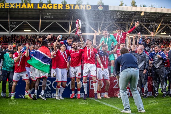 260425 - Wrexham v Charlton Athletic - Sky Bet League 1 - James McClean of Wrexham AFC lifts the Sky Bet League 1 Promotion trophy