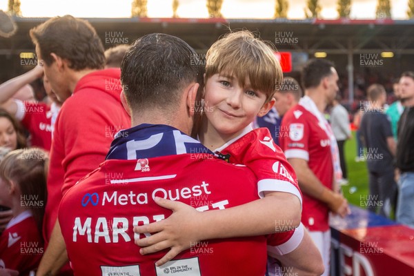 260425 - Wrexham v Charlton Athletic - Sky Bet League 1 - Jack Marriott of Wrexham AFC with his son