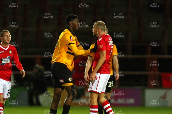 011218  Wrexham AFC v Newport County - Emirates FA Cup - Round 2 -  Tyreeq Bakinson of Newport County and Luke Summerfield of Wrexham have a disagreement  