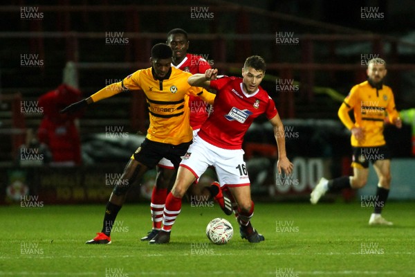 011218  Wrexham AFC v Newport County - Emirates FA Cup - Round 2 -  Tyreeq Bakinson of Newport County loses out to Brad Walker of Wrexham