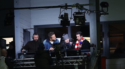 130326 - Wrexham v Swansea City - Sky Bet Championship - Wrexham owners Ryan Reynolds and Rob McElhenney in the gantry preparing to broadcast the match for Sky
