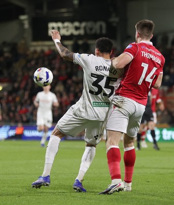 130326 - Wrexham v Swansea City - Sky Bet Championship - Ronald of Swansea and George Thomason of Wrexham