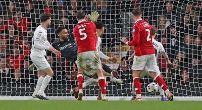 130326 - Wrexham v Swansea City - Sky Bet Championship - Callum Doyle of Wrexham puts the ball past Goalkeeper Lawrence Vigouroux of Swansea for the 2nd Wrexham goal