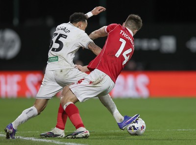 130326 - Wrexham v Swansea City - Sky Bet Championship - Ronald of Swansea and George Thomason of Wrexham