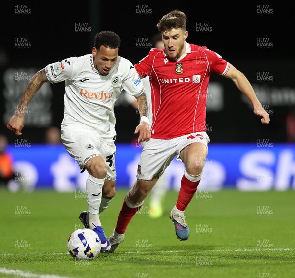 130326 - Wrexham v Swansea City - Sky Bet Championship - Ronald of Swansea and George Thomason of Wrexham