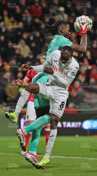 130326 - Wrexham v Swansea City - Sky Bet Championship - Malick Yalcouye of Swansea has his shot on goal saved by Goalkeeper Arthur Okonkwc of Wrexham