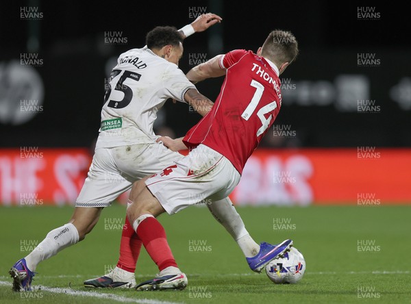 130326 - Wrexham v Swansea City - Sky Bet Championship - Ronald of Swansea and George Thomason of Wrexham