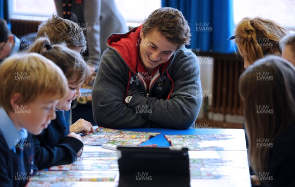 061113 - Wales Rugby Players Back to School - Jonathan Davies at his former school Ysgol Dyffryn Taf in Whitland where he has helped children take advantage of a variety of resources provided by the WRU initiative designed to introduce its new 'mascot' to the nation's children