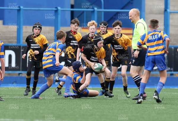 220522 - WRU Cardiff Rugby Land Rover Cup Finals Day - Builth Wells, black and yellow, compete against Old Pens in the U12s Plate Final