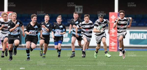 220522 - WRU Cardiff Rugby Land Rover Cup Finals Day - Llanharan, blue and black, take on Pontyclun in the U13 Plate Final