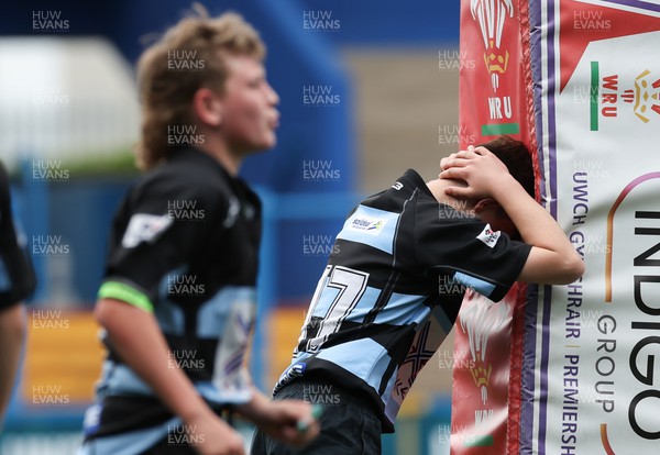 220522 - WRU Cardiff Rugby Land Rover Cup Finals Day - Llanharan, blue and black, take on Pontyclun in the U13 Plate Final