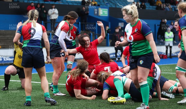 290123 - WRU Development XV v Combined Provinces XV - Wales celebrate as Sioned Harries of WRU Development XV scores try