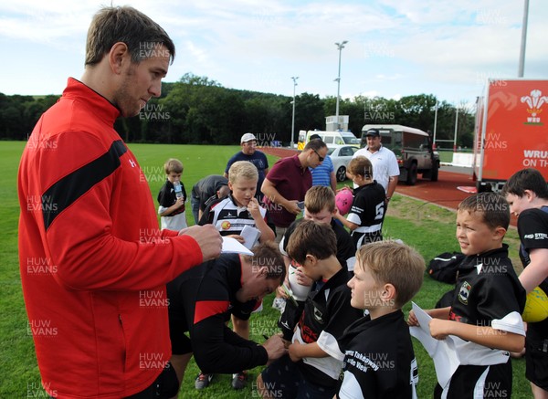 180813 - WRU - Admiral Festival of Rugby -Ryan Jones and Gethin Jenkins sign young rugby players merchandise at the Admiral Festival of Rugby