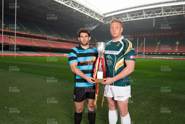 240419 - WRU Finals Day Photocall - Joe Tomlinson, captain of Cardiff,  left, and Merthyr captain Craig Locke whose teams will compete in the Cup Final, during photocall with the trophy ahead of the match