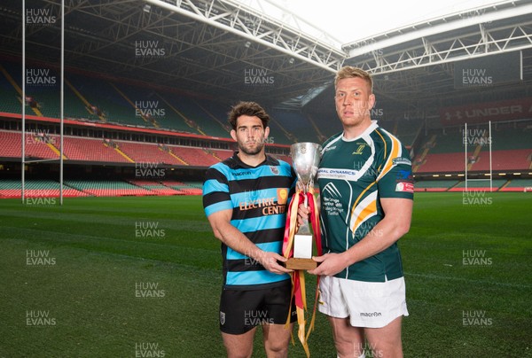 240419 - WRU Finals Day Photocall - Joe Tomlinson, captain of Cardiff,  left, and Merthyr captain Craig Locke whose teams will compete in the Cup Final, during photocall with the trophy ahead of the match