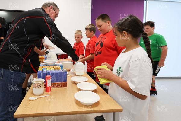 300823 - WRU Fit, Fed and Fun camp at Cardiff West High School - Children gather for breakfast at the start of the Fit,Fed and Fun camp