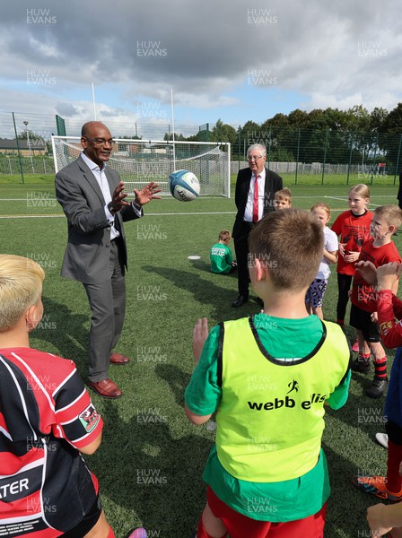 300823 - WRU Fit, Fed and Fun camp at Cardiff West High School - Welsh First Minister Mark Drakeford and  WRU interim CEO Nigel Walker join children to take part in a rugby skills and activities session at the Fit,Fed and Fun camp