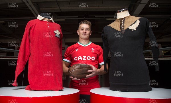120821 - WRU Press Conference - Wales' Jonathan Davies with shirts from the Wales v NZ match in 1905 and vintage match ball, after speaking to the media during a press conference at the Principality Stadium reviewing last session and looking forward to the Autumn Series of International matches