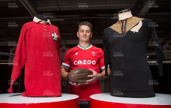 120821 - WRU Press Conference - Wales' Jonathan Davies with shirts from the Wales v NZ match in 1905 and vintage match ball, after speaking to the media during a press conference at the Principality Stadium reviewing last session and looking forward to the Autumn Series of International matches