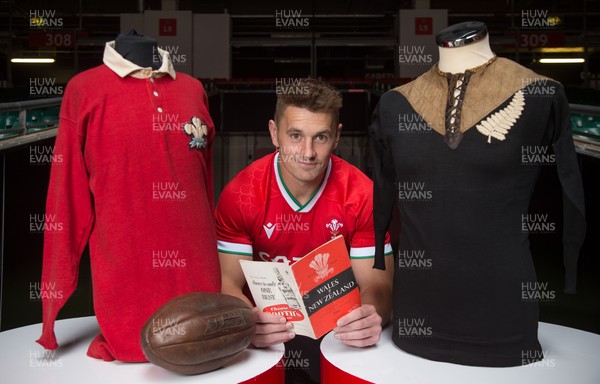 120821 - WRU Press Conference - Wales' Jonathan Davies with shirts from the Wales v NZ match in 1905, match programme from 1953 and vintage match ball, after speaking to the media during a press conference at the Principality Stadium reviewing last session and looking forward to the Autumn Series of International matches