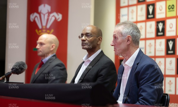 141223 - Welsh Rugby Union Press Conference - WRU interim CEO Nigel Walker, centre, with new Wales senior men's assistant coach Rob Howley, right, and new Wales U20s head coach Richard Whiffin, left, during a press conference to announce the coaching appointments